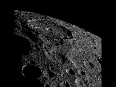 Occator Crater, home of Ceres' intriguing brightest areas, is prominently featured in this image from NASA's Dawn spacecraft. (NASA/JPL-Caltech/UCLA/MPS/DLR/IDA)