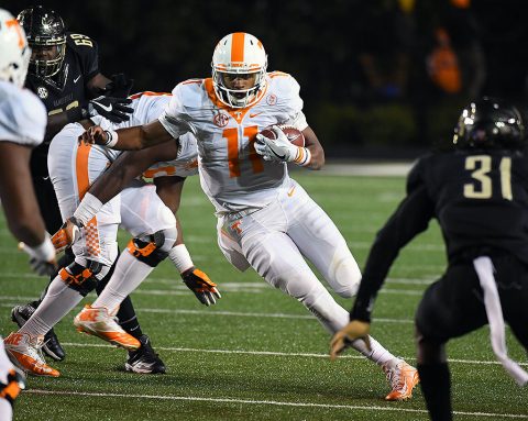 Tennessee Volunteers quarterback Joshua Dobbs (11) runs for a short gain during the second half against the Vanderbilt Commodores at Vanderbilt Stadium. Vanderbilt won 45-34. (Christopher Hanewinckel-USA TODAY Sports)