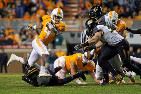 Tennessee Volunteers running back John Kelly (4) runs the ball against the Missouri Tigers during the second half at Neyland Stadium. Tennessee won 63-37. (Randy Sartin-USA TODAY Sports)