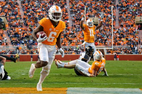 Tennessee Volunteers quarterback Joshua Dobbs (11) signals a touchdown as Tennessee Volunteers running back Alvin Kamara (6) scores against the Missouri Tigers during the second quarter at Neyland Stadium. (Randy Sartin-USA TODAY Sports)