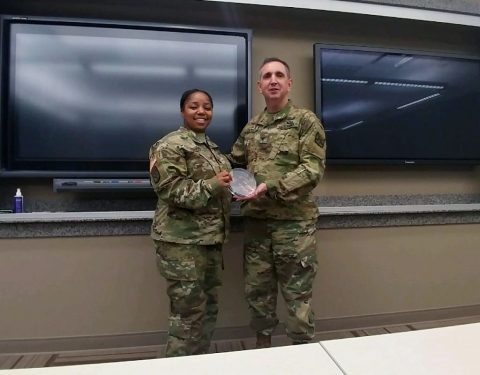 Sgt. 1st Class Ashley Davis (left), the Sexual Assault Response Coordinator for the 101st Airborne Division (Air Assault) Sustainment Brigade, 101st Abn. Div., receives the Sexual Harassment/Assault Response and Prevention Program Spirit Award at Sexual Assault Response Coordinator/Victim Advocate Career Course, at Fort Leavenworth, Kansas. (Sgt. 1st Class Ashley Davis) 