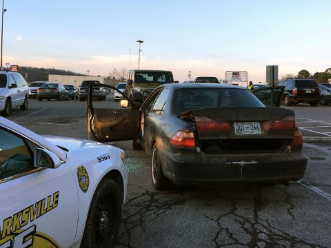 Clarksville Police Officers arrest Eric Todd Jackson in the Big Lots parking lot.