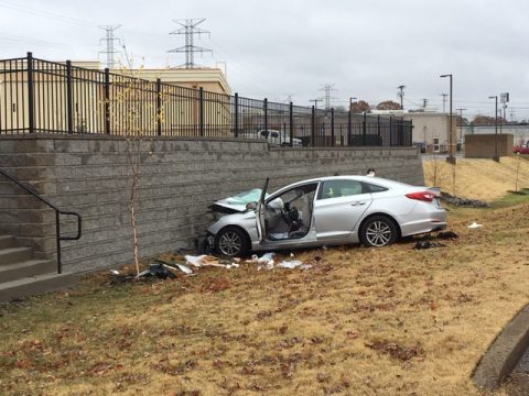 Hyundai Sonata leaves roadway and crashes into retaining wall near Governor's Square Mall Sunday.