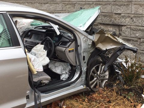 Hyundai Sonata leaves roadway and crashes into retaining wall near Governor's Square Mall Sunday.