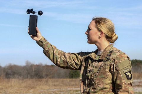 Sgt. Kathryn Kidwell, a motor transport operator with 74th Transportation Company, 129th Combat Sustainment Support Battalion, 101st Airborne Division (Air Assault) Sustainment Brigade, 101st Abn. Div., holds a wind drift indicator to check the wind speed on Suckchon Drop Zone, Dec. 7, 2016, on Fort Campbell, KY. Kidwell and Soldiers from her company partnered with parachute riggers from 861st Quartermaster Company, a reserve unit from Nashville, TN, to perform aerial delivery and recovery training. (Sgt. Neysa Canfield/101st Airborne Division Sustainment Brigade Public Affairs)