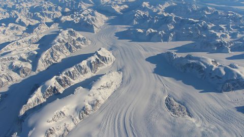 The texture on the surface of flowing ice, such as Heimdal Glacier in southern Greenland, allows Landsat 8 to map nearly all the flowing ice in the world. (NASA/John Sonntag)