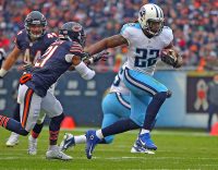 Tennessee Titans running back Derrick Henry (22) runs past Chicago Bears cornerback Tracy Porter (21) during the second quarter at Soldier Field. (Dennis Wierzbicki-USA TODAY Sports)