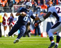 Tennessee Titans quarterback Marcus Mariota (8) slides for a first down during the first half against the Denver Broncos at Nissan Stadium. (Christopher Hanewinckel-USA TODAY Sports)
