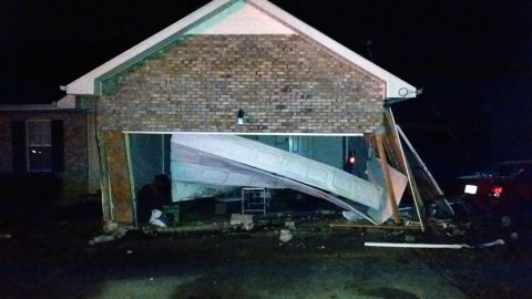 Vehicle leaves roadway and crashes into house on Meredith Way early Sunday morning.