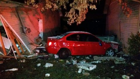 Vehicle leaves roadway and crashes into house on Meredith Way early Sunday morning.