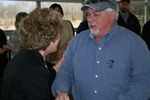 Clarksville Mayor Kim McMillan greets the staff members at CDE Lightband who earned Employee Service Awards from the City of Clarksville this year. Among them are Russell Harris and Larry Waynick, who both reached 45-year milestones with the City’s power utility.