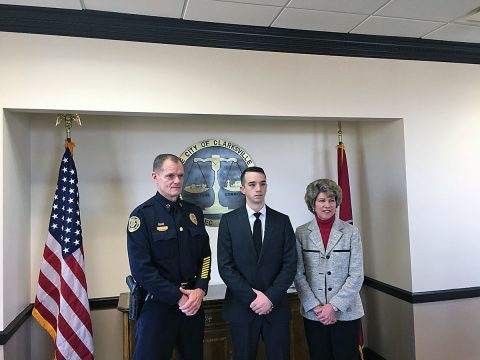 Chief Al Ansley, Brendan Davis, Clarksville Mayor Kim McMillan