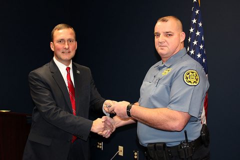 Montgomery County Sheriff John Fuson congratulates Daniel Black