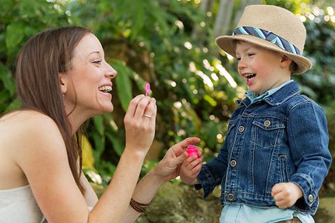 Dr. Sarah Woolf-King, Ph.D., M.P.H. plays with two-year-old son Charlie in 2014. (Gayle Photography)
