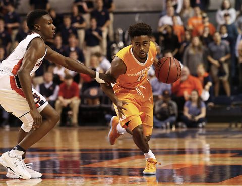 Tennessee Volunteers guard Jordan Bone (0) moves past Auburn Tigers guard Jared Harper (1) during the first half at Auburn Arena. (John Reed-USA TODAY Sports)