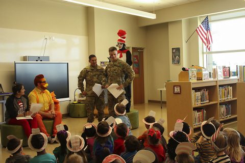 Two Soldiers from the 716th Military Police Battalion, 101st Airborne Division (Air Assault) Sustainment Brigade, 101st Abn. Div., participate in a rehearsal of “The Cat in the Hat” production staff members of Marshall Elementary School put together for the students, March 2, 2017, at Marshall Elementary School on Fort Campbell, Kentucky. (Sgt. Neysa Canfield/101st Airborne Division Sustainment Brigade Public Affairs) Two Soldiers from the 716th Military Police Battalion, 101st Airborne Division (Air Assault) Sustainment Brigade, 101st Abn. Div., participate in a rehearsal of “The Cat in the Hat” production staff members of Marshall Elementary School put together for the students, March 2, 2017, at Marshall Elementary School on Fort Campbell, Kentucky. (Sgt. Neysa Canfield/101st Airborne Division Sustainment Brigade Public Affairs)