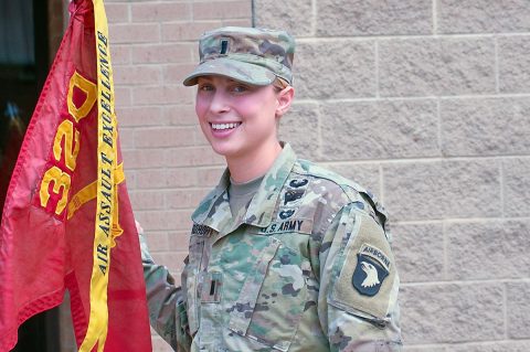 U.S Army 1st Lt. Austen Boroff, platoon leader, Battery C, 1st Battalion, 320th Field Artillery Regiment, 101st Airborne Division (Air Assault) poses near her battery’s guidon, Mar 24, 2017, at Fort Campbell, KY. Boroff, a graduate of the United States Military Academy was the first female platoon leader in 1-320th’s history to lead Soldiers in a combat environment. (1st Lt. Daniel Johnson) 