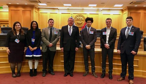 Representative Curtis Johnson poses with the Austin Peay students.