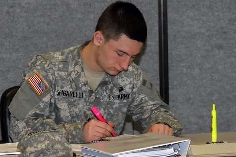 Spc. Domenic Spigarelli, a test, measurement and diagnostic equipment maintenance support specialist with 129th Combat Sustainment Support Battalion, 101st Airborne Division (Air Assault) Sustainment Brigade, 101st Abn. Div., highlights information in his textbook before class Jan. 31, 2017, at the Kinnard Mission Training Complex, Fort Campbell, Kentucky. (Sgt. Neysa Canfield/101st Airborne Division Sustainment Brigade Public Affairs) 