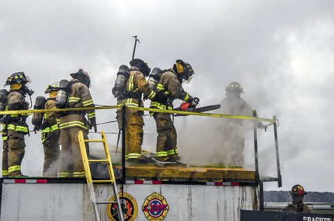 Soldiers assigned to 550th Engineer Detachment, 716th Military Police Battalion, supported at Fort Campbell by the 101st Airborne Division Sustainment Brigade, 101st Airborne Division, perform vertical ventilation training at the second annual Light and Fight Feb. 18, 2017, at the Fort Campbell Fire Training Facility near Campbell Army Airfield. (Leejay Lockhart, Fort Campbell Public Affairs Office)