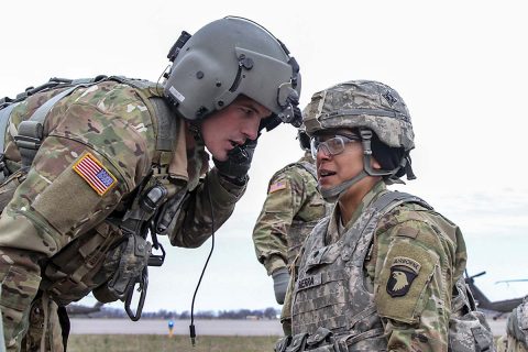 Spc. Janet Sierra (right), a cable systems installer-maintainer with 101st Special Troops Battalion, 101st Airborne Division (Air Assault) Sustainment Brigade, 101st Abn. Div., relays a simulated patient’s medical information to Staff Sgt. Andrew J. Six (left), a flight paramedic noncommissioned officer with Company C, 6th Bn., 101st Aviation Regiment, 101st Combat Avn. Bde., 101st Abn. Div., March 16, 2017, during medical evacuation training at Hanger 5, Fort Campbell, Kentucky. (Sgt. Neysa Canfield/101st Airborne Division Sustainment Brigade Public Affairs) Spc. Janet Sierra (right), a cable systems installer-maintainer with 101st Special Troops Battalion, 101st Airborne Division (Air Assault) Sustainment Brigade, 101st Abn. Div., relays a simulated patient’s medical information to Staff Sgt. Andrew J. Six (left), a flight paramedic noncommissioned officer with Company C, 6th Bn., 101st Aviation Regiment, 101st Combat Avn. Bde., 101st Abn. Div., March 16, 2017, during medical evacuation training at Hanger 5, Fort Campbell, Kentucky. (Sgt. Neysa Canfield/101st Airborne Division Sustainment Brigade Public Affairs)