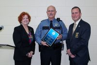 (L to R) Kaye Jones, Deputy Steve Moss and Montgomery County Sheriff John Fuson.