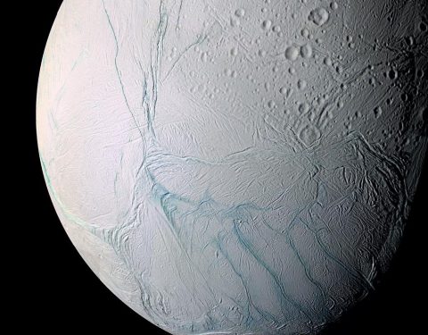 This enhanced-color Cassini view of southern latitudes on Enceladus features the bluish "tiger stripe" fractures that rip across the south polar region. (NASA)