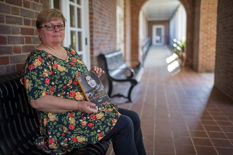 APSU's Dr. Beatrix Brockman with her book “Angelika Schrobsdorff: Leben ohne Heimat”.