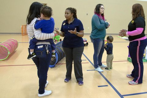 Griscelda Perez, (left), speaks with Phalecian Rawlins, Family Advocacy Program specialist, while she holds her son, Alexis, 21 months, April 6, 2017, at Taylor Youth Center on Fort Campbell, Kentucky. Rawlins was explaining what normal behavior is for Alexis’s age and telling Perez about the other programs FAP offers. Play Morning is from 9-10:30 a.m. every Thursday and is geared toward children younger than 3. (Heather Huber, Fort Campbell Public Affairs Office)