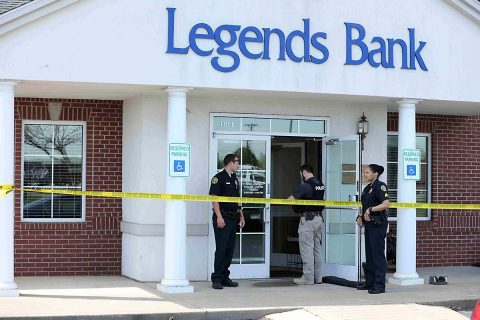 Clarksville Police investigating the robbery at Legends Bank Monday.