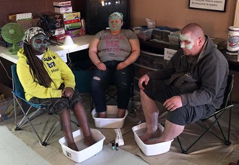 Psychosocial Recovery clients enjoy a foot spa.