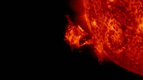 A solar eruption on Sept. 26, 2014, seen by NASA's Solar Dynamics Observatory. If erupted solar material reaches Earth, it can deplete the electrons in the upper atmosphere in some locations while adding electrons in others, disrupting communications either way. (NASA)