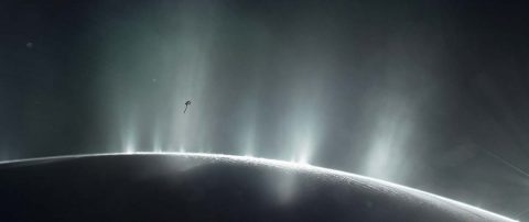 This artist's rendering shows Cassini diving through the Enceladus plume in 2015. New ocean world discoveries from Cassini and Hubble will help inform future exploration and the broader search for life beyond Earth. (NASA/JPL-Caltech)