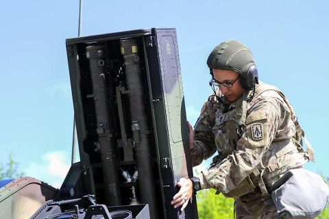 Spc. Bradley Muszalski, an air and missile defense crewmember assigned to Battery C, 2nd Battalion, 44th Air Defense Artillery Regiment, 101st Airborne Division (Air Assault) Sustainment Brigade, 101st Abn. Div., closes the door to a missile launcher pod, April 25, 2017, during missile upload and download crew drill on Fort Campbell, Kentucky. Muszalski conducted the drills as part of his battery’s field training exercise. (Sgt. Neysa Canfield/101st Airborne Division Sustainment Brigade Public Affairs) 