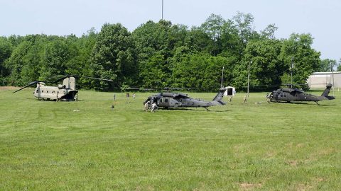 Soldiers from E Company, 6th Battalion, 101st General Support Aviation Battalion, 101st Combat Aviation Brigade, 101st Airborne Division, rush to refuel two UH-60 Black Hawk helicopters as part of a “fat cow” mission, where a CH-47 Chinook helicopter transports fuel to a forward location May 11, 2017, at Fort Campbell, Kentucky.  (Leejay Lockhart, Fort Campbell Public Affairs Office)