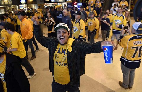Nashville Predators fans celebrate as they leave Bridgestone Arena following a 3-1 win against the St. Louis Blues in game six of the second round of the 2017 Stanley Cup Playoffs. (Christopher Hanewinckel-USA TODAY Sports)
