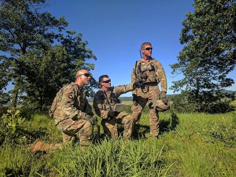 U.S. Army 1st Lt. David Souliotis, platoon leader, Company A, 2nd Battalion, 502nd Infantry Regiment, 2nd Brigade Combat Team, 101st Airborne Division (Air Assault) center, briefs Capt. Nathan Goldsmith, commander, Company C, 2-502, during 2-502 IN's deployment to the Exportable Combat Training Capability at Fort McCoy, Wisconsin, Jun. 16, 2017. (1st Lt. Riley Foster)