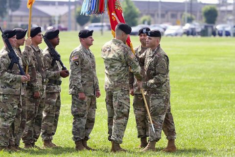 Col. Joseph McCallion, commander of 108th Air Defense Artillery Brigade from Fort Bragg, North Carolina, passes the battalion colors to Lt. Col. Ryan L. Schrock, incoming commander for the 2nd Battalion, 44th ADA Regiment, assigned to the 108th ADA Bde., and attached to the 101st Airborne Division (Air Assault) Sustainment Bde., 101st Abn. Div., during the battalion’s change of command ceremony, June 21, 2017, at the division parade field on Fort Campbell, Kentucky. (Neysa Canfield/101st SBDE Public Affairs) 