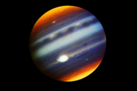 This composite, false-color infrared image of Jupiter reveals haze particles over a range of altitudes, as seen in reflected sunlight. It was taken using the Gemini North telescope in Hawaii on May 18, 2017, in collaboration with observations of Jupiter by NASA's Juno mission.