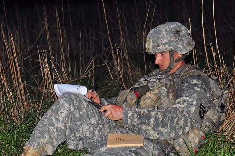 Sgt. Michael Smith, a senior transmission systems operator/maintainer with 58th Signal Company, 101st Special Troops Battalion, 101st Airborne Division (Air Assault) Sustainment Brigade, 101st Abn. Div., plots his coordinates, March 30, 2017, during the nigh land navigation portion of the 101st Abn. Div. (Staff Sgt. Todd L. Pouliot/40th Public Affairs Detachment)