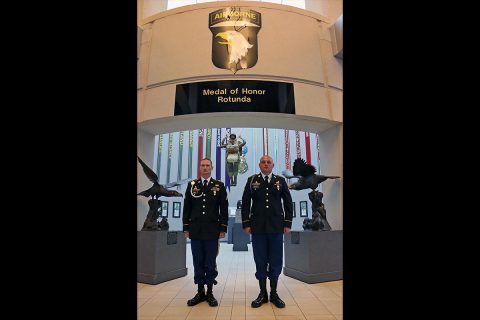 Sgt. Michael Smith, left, a senior transmission systems operator/maintainer assigned to 58th Signal Company, 101st Airborne Division (Air Assault) Sustainment Brigade was named Noncommissioned Officer of the Year for the 101st Airborne Division (Air Assault). (Staff Sgt. Todd L. Pouliot/40th Public Affairs Detachment) 