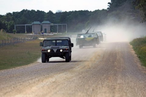 Soldiers with the 2nd Battalion, 502nd Infantry Regiment of Fort Campbell, Ky., drive in a convoy outside of Integrated Tactical Training Base Freedom on South Post during operations for the Exportable Combat Training Capability (XCTC) Exercise on June 9, 2017, at Fort McCoy, WI. (Scott T. Sturkol, Public Affairs Office, Fort McCoy, WI) 