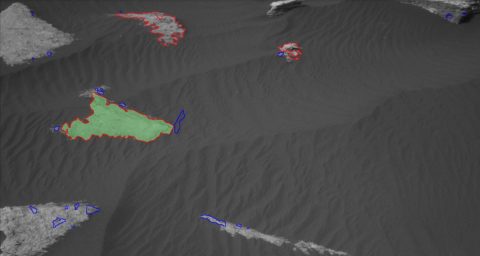 This is how AEGIS sees the Martian surface. All targets found by the A.I. program are outlined: blue targets are rejected, while red are retained. The top-ranked target is shaded green; if there's a second-ranked target, it's shaded orange. These NavCam images have been contrast-balanced. (NASA/JPL-Caltech)