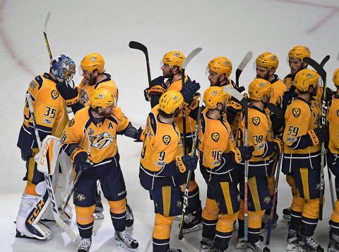 Nashville Predators goalie Pekka Rinne (35) is congratulated by teammates after beating the Pittsburgh Penguins 4-1 in game four of the 2017 Stanley Cup Final at Bridgestone Arena. (Scott Rovak-USA TODAY Sports)