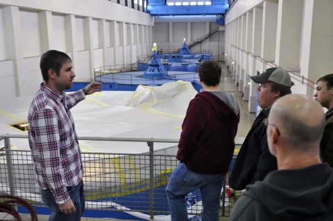 U.S. Army Corps of Engineer, Nashville District employees Jamie Holt, a power project specialist at the Lake Barkley power plant shows students and faculty from University of Tennessee at Martin Hydrology and Hydraulics class maintenance being performed on a generator at the Lake Barkley power plant. (Mark Rankin, USACE) U.S. Army Corps of Engineer, Nashville District employees Jamie Holt, a power project specialist at the Lake Barkley power plant shows students and faculty from University of Tennessee at Martin Hydrology and Hydraulics class maintenance being performed on a generator at the Lake Barkley power plant. (Mark Rankin, USACE)
