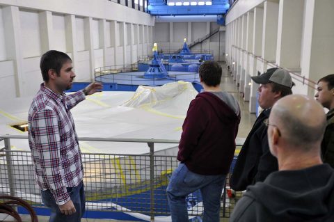 U.S. Army Corps of Engineer, Nashville District employees Jamie Holt, a power project specialist at the Lake Barkley power plant shows students and faculty from University of Tennessee at Martin Hydrology and Hydraulics class maintenance being performed on a generator at the Lake Barkley power plant. (Mark Rankin, USACE) 