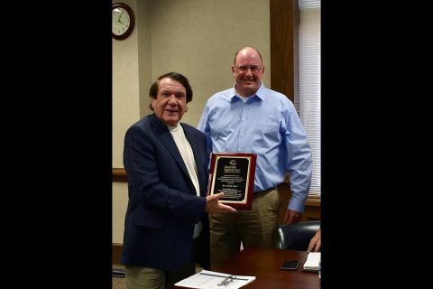 Charles Hand, left, was recognized for 10 years of service to the Clarksville-Montgomery County Airport Authority. (Tommy Vallejos)