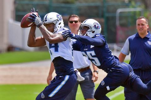 Tennessee Titans wide receiver Corey Davis (84) catches a pass against Tennessee corner back Adoree Jackson (25) St Thomas Sports Park. (Jim Brown-USA TODAY Sports)