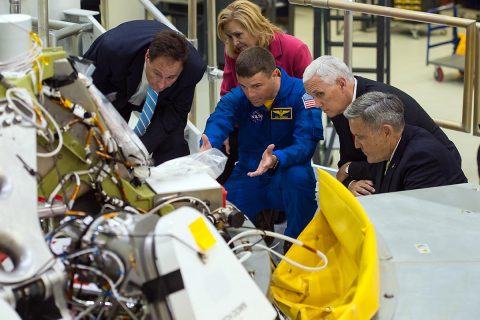 Vice President Mike Pence, second from right, looks at the Orion capsule that will fly on the first integrated flight with the Space Launch System rocket in 2019, during a tour of the Kennedy Space Center's (KSC) Operations and Checkout Building on Thursday, July 6, 2017. The Vice President was joined by NASA Acting Administrator Robert Lightfoot, left; Kennedy Space Center Deputy Director Janet Petro, second from left; NASA astronaut Reid Wiseman, center; and Kennedy Space Center Director Robert Cabana, right. (NASA/Aubrey Gemignani)