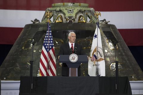 Vice President Mike Pence speaks before an audience of NASA leaders, U.S. and Florida government officials, and employees inside the Vehicle Assembly Building at NASA's Kennedy Space Center in Florida. Pence thanked employees for advancing American leadership in space. Behind the podium is the Orion spacecraft flown on Exploration Flight test-1 in 2014. (NASA/Kim Shiflett)